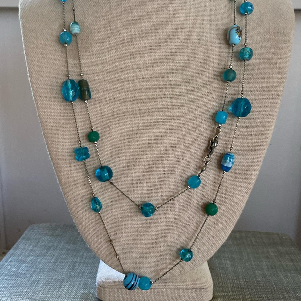 Long, single strand, blue glass beaded necklace